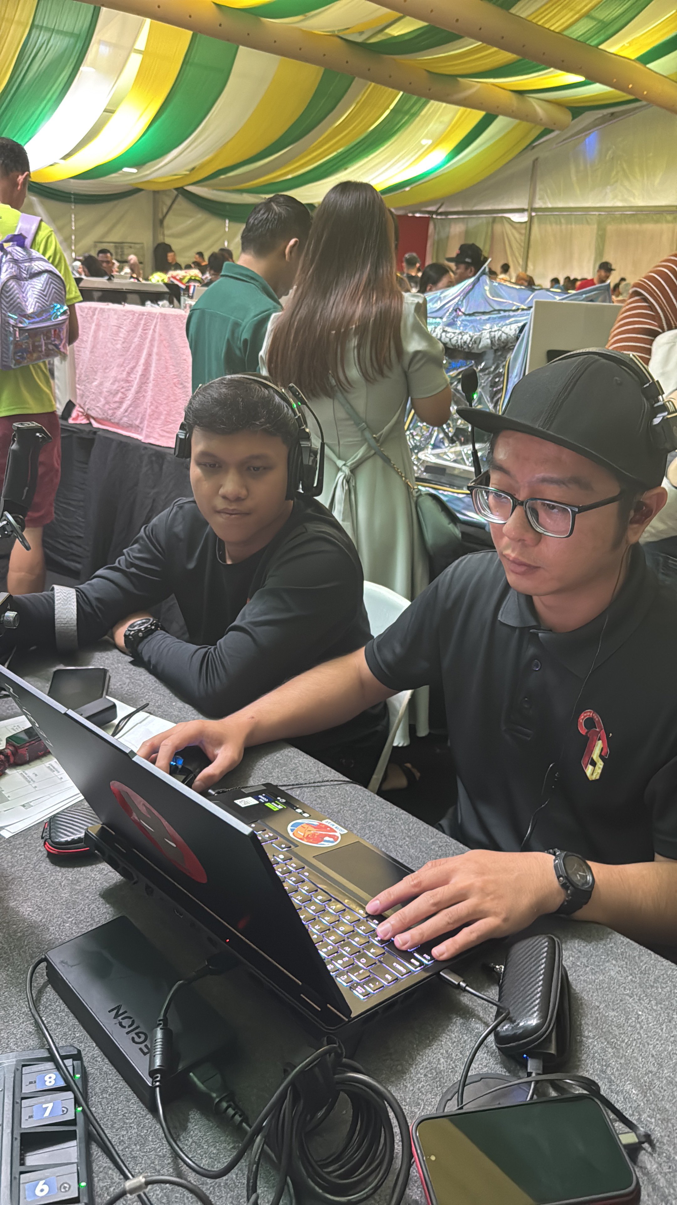 Event participants at laptops